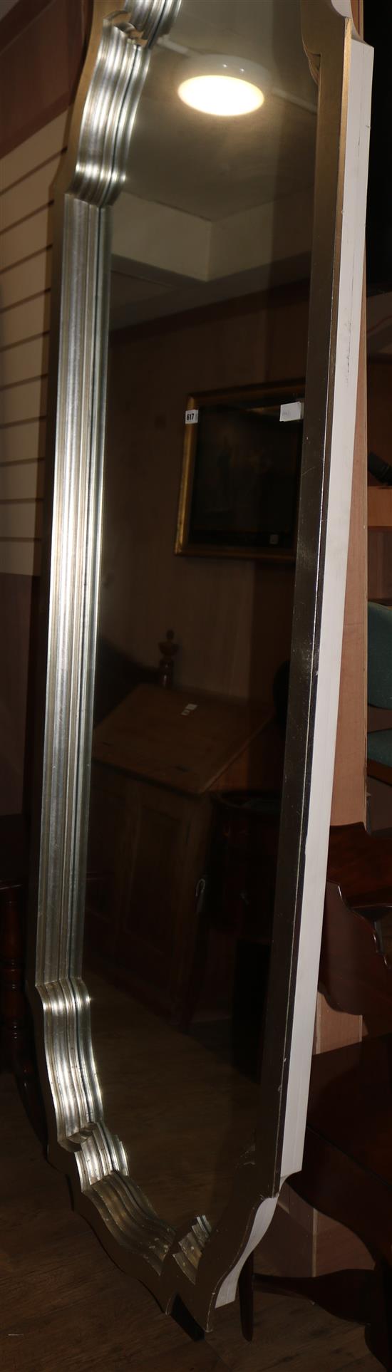 A large silver painted framed mirror, H.250cm